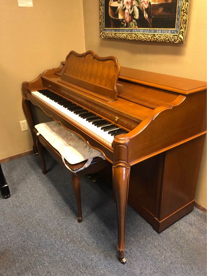 Baldwin Piano in Showroom Front Facing  with Matching Bench
