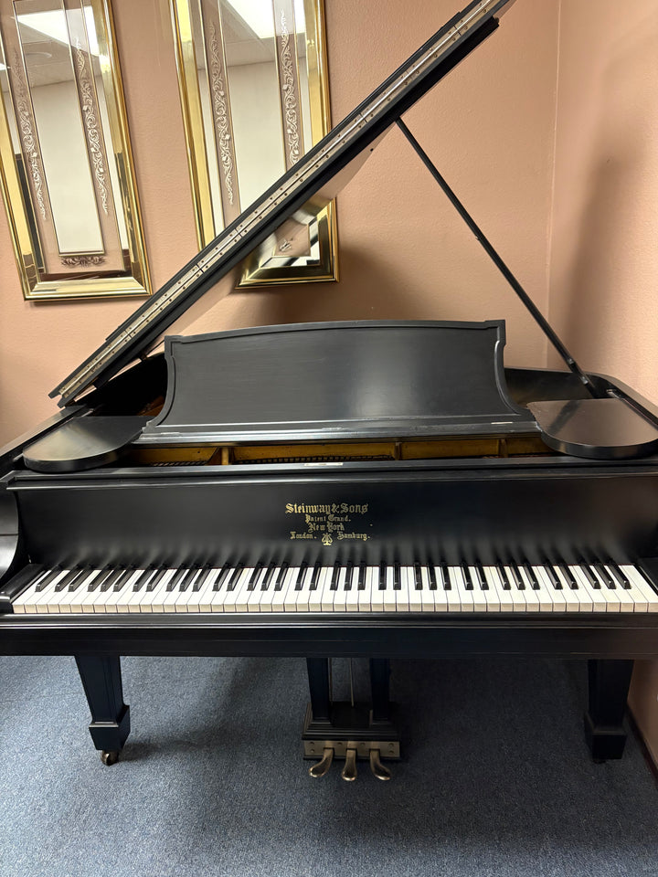 Steinway Model M 5 foot 7 inch baby grand piano with semi gloss ebony finish professionally restored