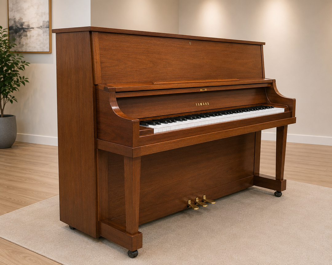 Yamaha P22 45-inch studio upright piano in Satin Walnut, three-quarter showroom view